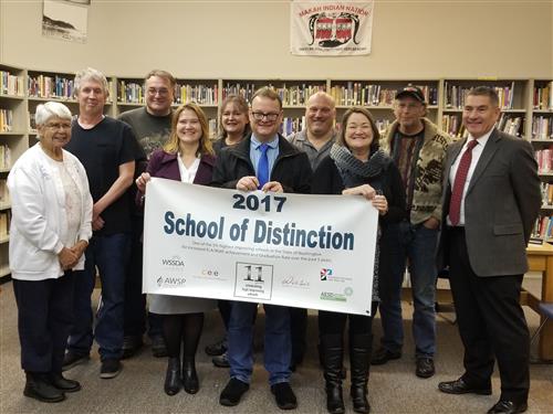Clallan & Neah Bay Principals, Cape Flattery Superintendent & Board, OESD Board member & Superintendent with banner 
