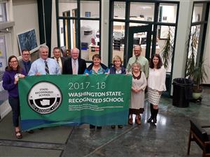 Photo with PA School Board and Superintendent holding Banner 2017-18 WA State Recognized School 
