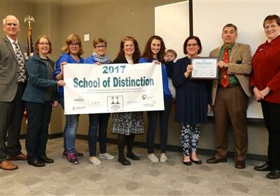 CKSD Superintendent &amp; Board President, Woodlands Principal &amp; Staff, OESD Suerintendent with Banner